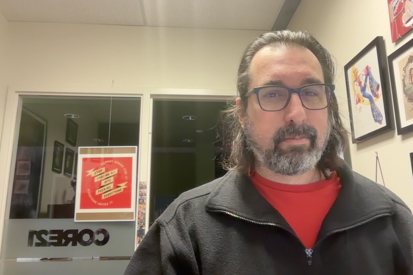 Art wall with STOP FORCING AI INTO FUCKING EVERYTHING poster